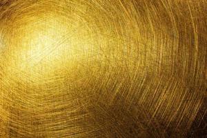 flat shiny brushed brass texture with random pattern photo