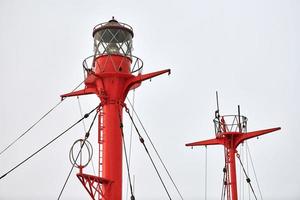 Mast and signal lamp of floating beacon, close up photo