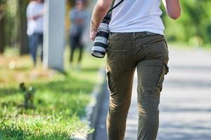 niña fotógrafa con cámara foto