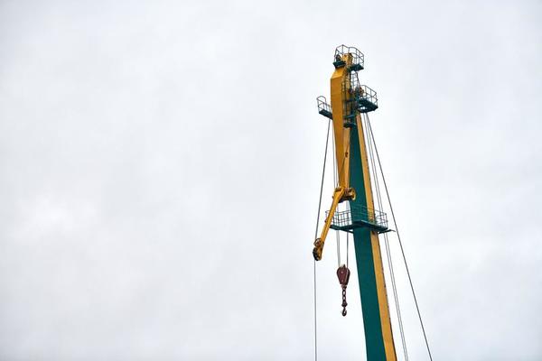 Cargo crane in container ship terminal, container yard