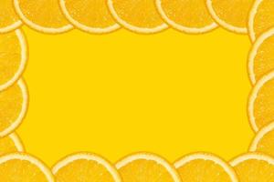 Fresh juicy fruit, orange, yellow background, copy space photo