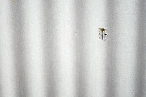 clean and minimalist wavy white wall texture for background photo