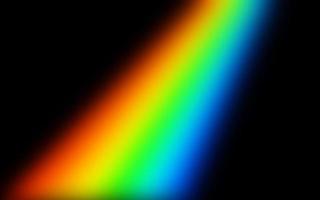 Rainbow color gradient on black background for texture overlay. Abstract creative texture for banner, wallpaper, backdrop, etc. Fun and cheerful vibes for photo effect lighting overlay