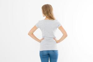 Woman in template blank t shirt isolated on white background. Back view. Mock up. Copy space. photo