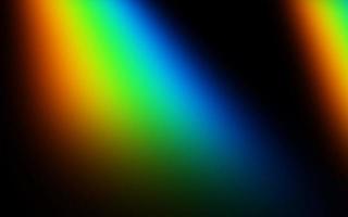 Rainbow color gradient on black background for texture overlay. Abstract creative texture for banner, wallpaper, backdrop, etc. Fun and cheerful vibes for photo effect lighting overlay
