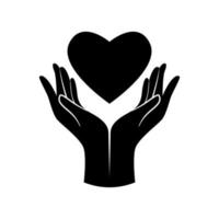 Vector black two female hands holding heart. Isolated on a white background. Charity icon, give and donate. Concept of health care, medicine and blood donation