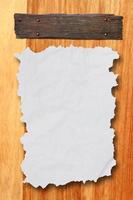 Empty white Crumpled paper on wood background photo