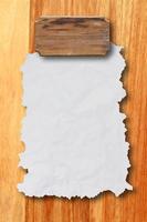 Empty white Crumpled paper on wood background photo