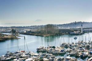 Tacoma, Washington, USA. March 2021. Puget Sound Yachts and Rainier Volcano View photo