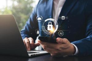 Cybersecurity and privacy concepts to protect data. Lock icon and internet network security technology. Businessmen protecting personal data on laptop and virtual interfaces. photo