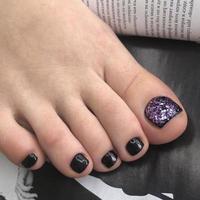 Purple pedicure. Purple pedicure on female feet photo