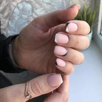 French manicure on the nails. French manicure design. Manicure gel nail polish photo