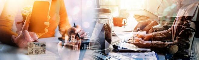 Businessman hands working with finances about cost and calculator and laptop with tablet, smartphone at office in morning light photo