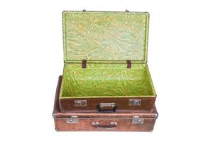 old brown soviet fiber suitcases one on top of other isolated on white photo