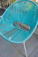 Close up of a broken terrace chair to be renewed photo