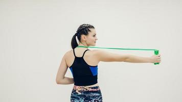 sporty girl doing muscle stretching photo