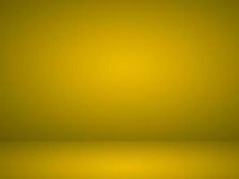 Abstract black and yellow gradient. Plain studio background photo