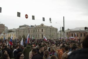 Moscow, Russia. 09 30 2022 People in Moscow with Russian flags. photo