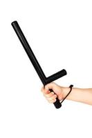 bare hand with black rubber police baton isolated on white background photo