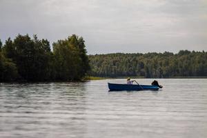 Woman swimming in boat 1 photo