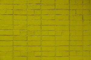 matte citrus green painted brick wall full frame flat background and texture photo