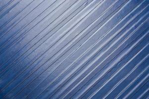 old blue pvc duct tape background with light reflection photo