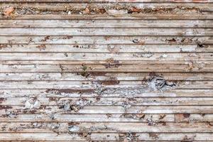 trash concrete wall with corrugated sheet imprint on it - horizontal lines structure photo