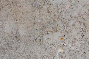 rough and bumpy cement industrial wall - flat texture and background photo