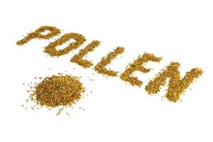 the word pollen laid with yellow pollen grain on white background with diagonal perspective photo