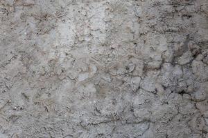 rough and bumpy cement industrial wall - flat texture and background photo