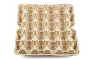 empty formed cardboard egg tray - closeup with edge-to-edge sharpness, isolated on white background photo
