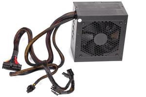 pc atx half-modular power supply isolated on white background with selective focus photo