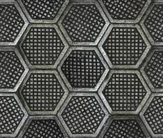 Cast iron hexagonal factory floor texture. photo