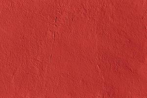 flat live coral color plaster wall matte texture photo