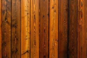 textura y fondo de tablones de madera rojizos y marrones foto