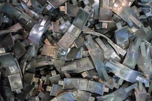 Many aluminium castings background view from above photo