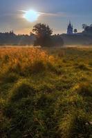 Church on hill morning meadow landscape photo