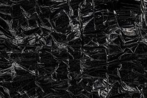 película de polietileno negro reforzada con cinta adhesiva paquete de contrabando plano textura de primer plano foto