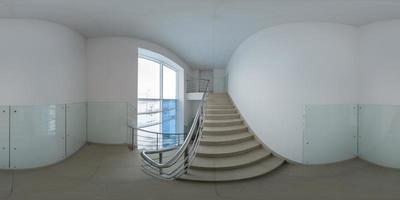 Seamless full spherical 360 degree panorama in equirectangular projection of stairway with white walls covered with glass panels photo