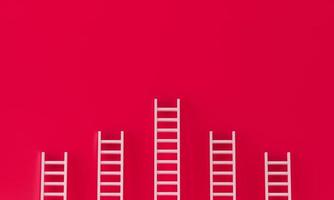 Ladder collection on red wall background. success concept with copy spaces for text. 3d rendering. photo