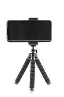 black cellphone in rugged rubber protective cover on small flexible tripod isolated on white photo