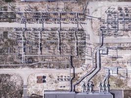 Aerial top down view of electric high voltage substation. photo