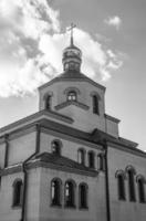 Christian church cross in high steeple tower for prayer photo