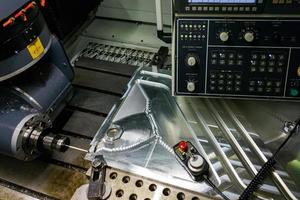 measuring process with ruby touch probe on large CNC milling machine in jog mode photo