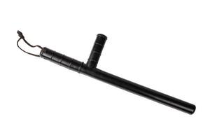 Black classic rubber police tonfa baton isolated on white background in top-down flat lay perspective. photo