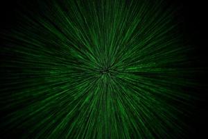 natural lens zoom explosion radial blurred green particles on black background with selective focus photo