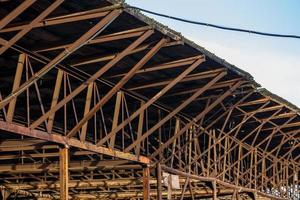 rusted roof supporting construction frame - close-up with selective focus photo