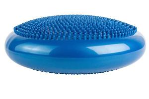 Blue inflatable balance disk isoleated on white background, It is also known as a stability disc, wobble disc, and balance cushion. photo