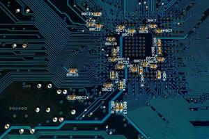 blue pcb board circuit close up technology background photo