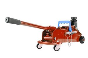 red hydraulic car jack isolated on white background, lowered photo